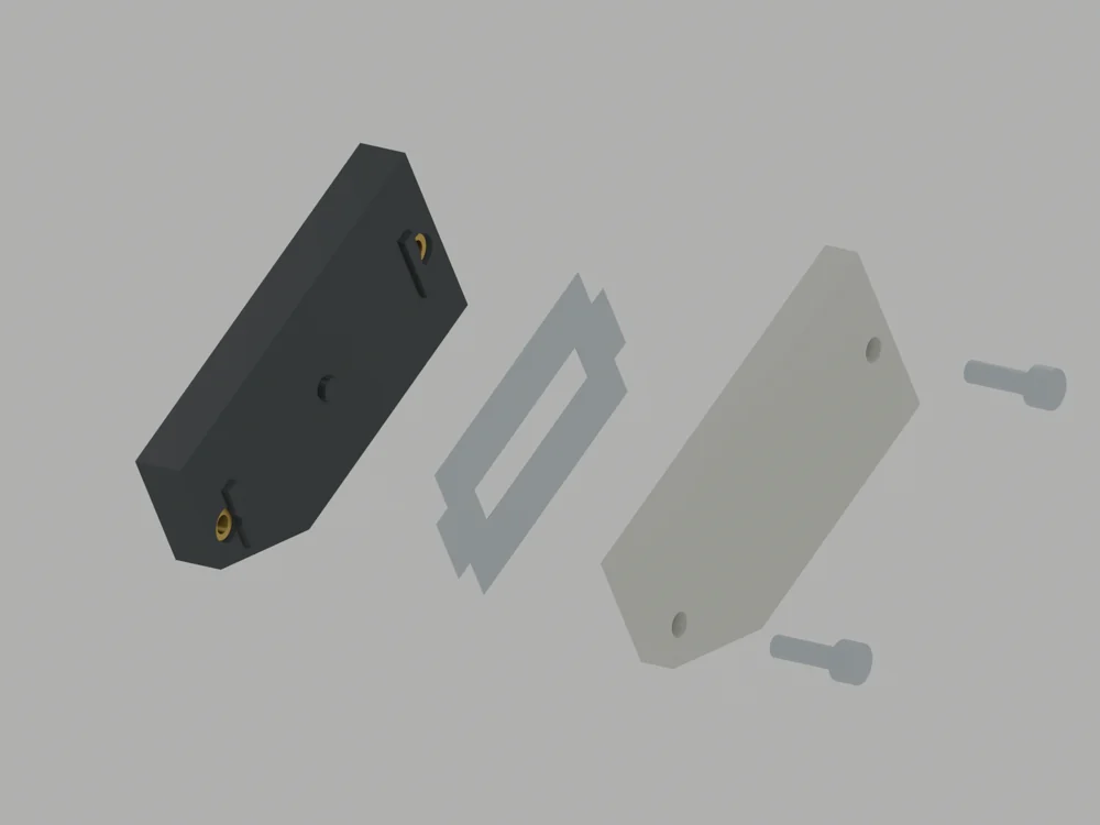 Exploded back jaw, thin double-edge blade, locking plate and two M3 screws